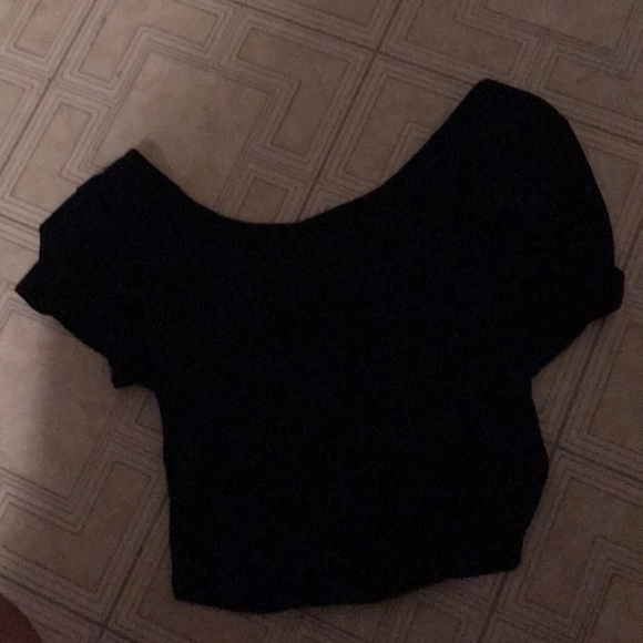 I’m selling a black crop top shirt - Picture 1 of 3
